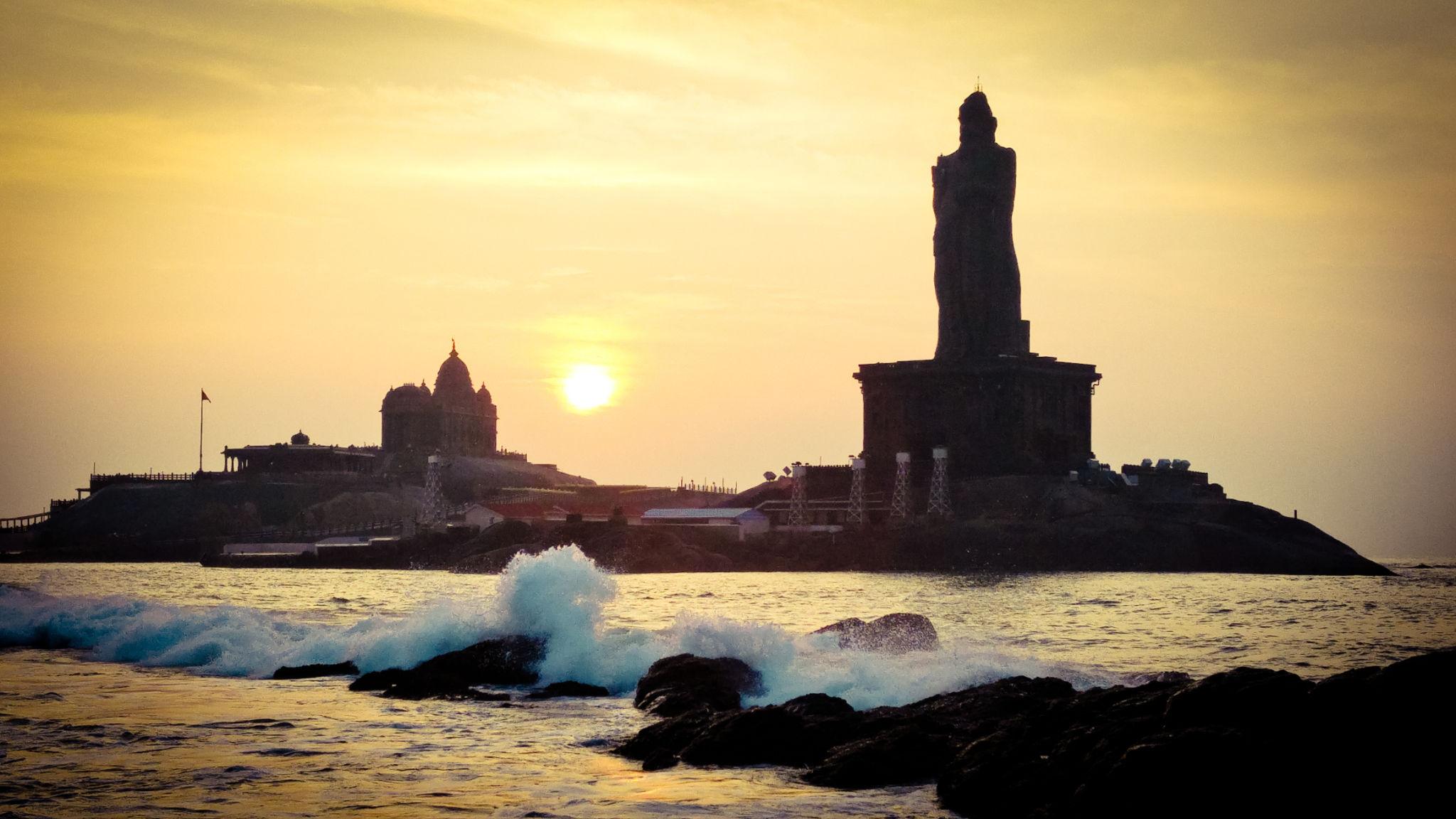 Vivekananda Rock Memorial silhouetted against the ocean horizon at Kanyakumari